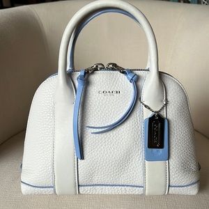 Never carried, Coach white pebbled leather crossbody bag.